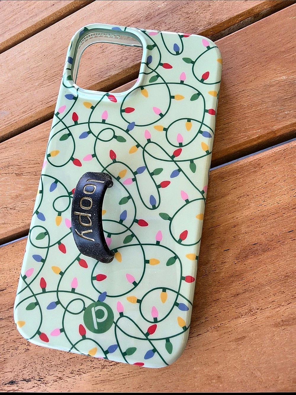 Loopy  iPhone 15 Case in Christmas lights pattern White & Green
